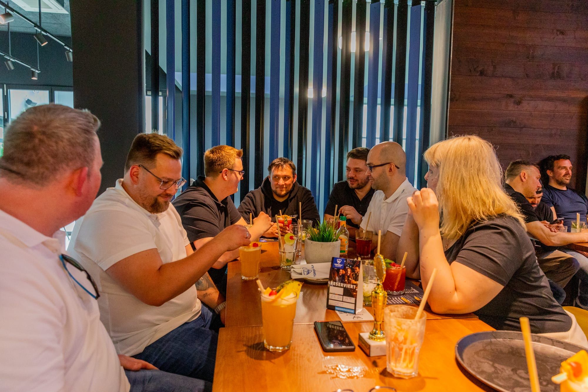 The evening at the long table, glasses and conversation